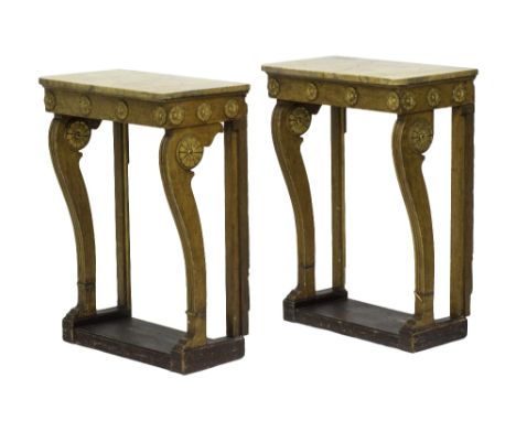 A pair of Regency design marble top console tables on gilt mounted sabre supports, united by platform undertier, 73cm wide.  