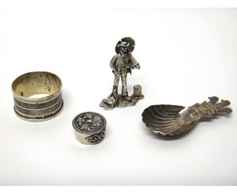 Silver, comprising; a model of a standing chimney sweep, London 1978, a tea caddy spoon, the handle formed as The Prince of W