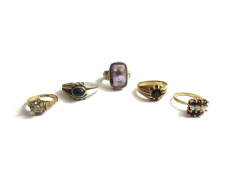 A 9ct gold and colourless gem set cluster ring, an amethyst set single stone ring, a 9ct gold, amethyst and cultured pearl se