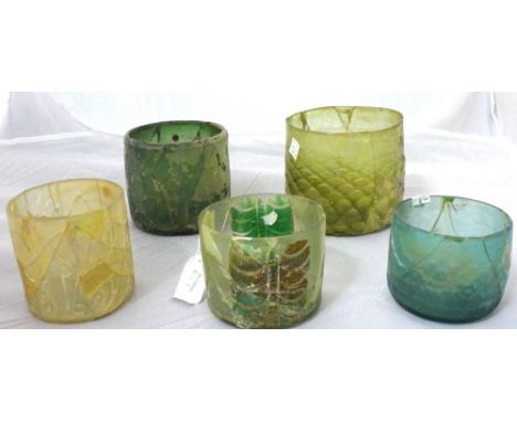 A rare clear glass beaker with applied decoration, probably Iraq, 9th century, of cylindrical form, the walls decorated with 