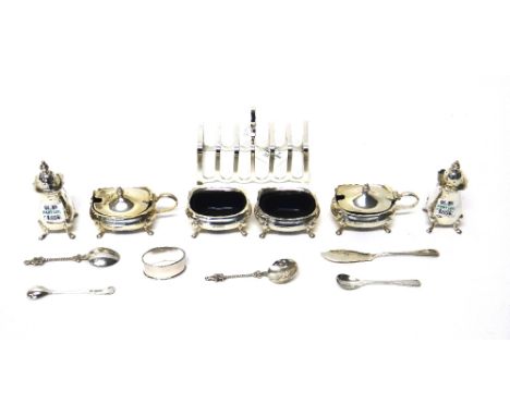 Silver, comprising; two mustard pots, two salts and two pepperettes, Birmingham 1964, 1965 and 1967, with four blue glass lin