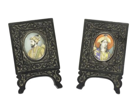 A pair of Indian miniature oval head and shoulder portraits of a prince and princess, late 19th/20th century, 5cm. by 4cm., c