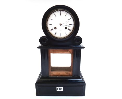 A French ebonised mantel clock, late 19th century, by 'Lewis et Son, Paris', the drum top case with a signed white enamel dia