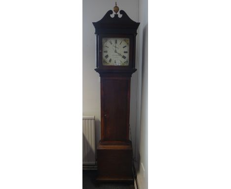 An early 19th century thirty hour oak longcase clock by 'Jno Bates, Cuckfield', with later ball and cresting above glazed dia