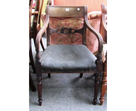 An early 19th century mahogany carver chair with bulls eye waist rail together with an 18th century oak tripod table, 42cm wi