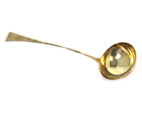 A George III hallmarked silver soup ladle with stag mask and antler engraved decoration to the terminal, George Smith and Wil