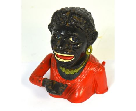 A c1910 vintage Dinah moneybox (female version).