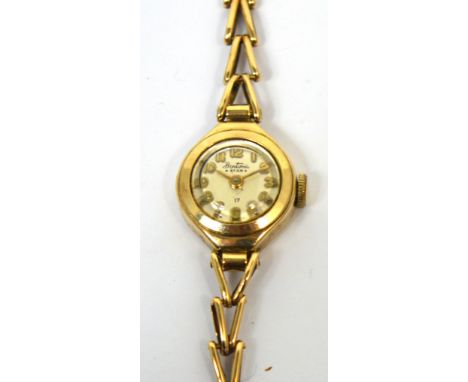 Bentima; a 9ct gold ladies' wristwatch, the enamel dial set with Arabic numerals on a 9ct gold link strap, approx 9.7g.