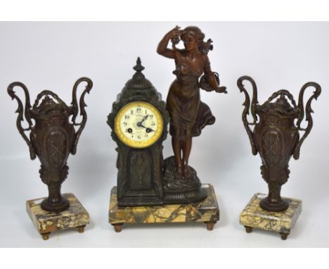 Samuel Marti French eight day clock garniture in the form of a metal dome topped building, the clock face with enamel dial se