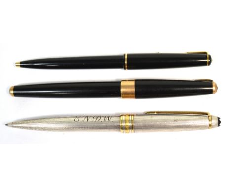 A boxed Mont Blanc Meistersteuck Collorcon silver ballpoint pen, sold with service guide and a boxed set of two Parker pens (