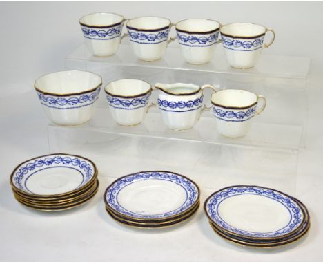 A Royal Crown Derby blue and white part tea service comprising six side plates, six saucers, six cups, jug and bowl, pattern 