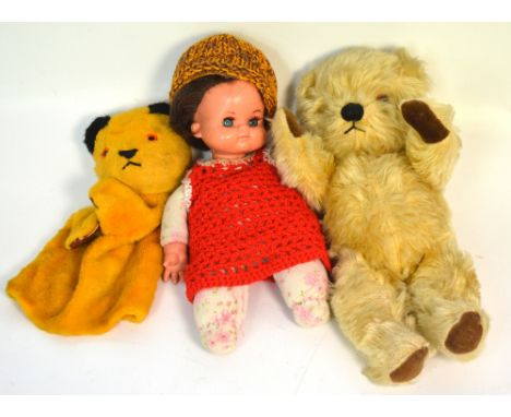 A vintage Sooty puppet, a vintage straw-filled teddy bear and a c1960s doll with 1960s crocheted dress (3).