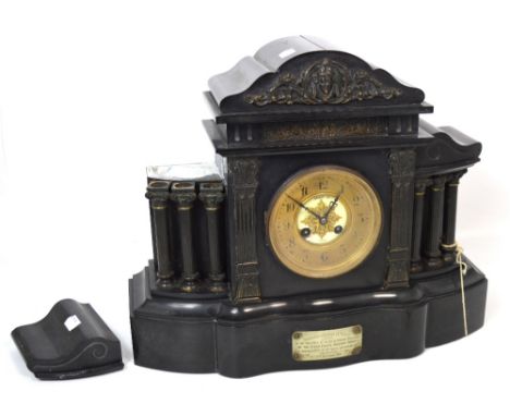 An early 20th century French slate eight day mantel clock, maker Grieve Co, Paris, the enamel and gilded dial set with Arabic