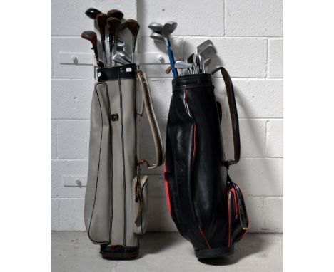 Two sets of vintage golf clubs to include Lynx, Yasudo, Wilson and boxes of golf balls to include Dunlop DDH110, Golden Bear 