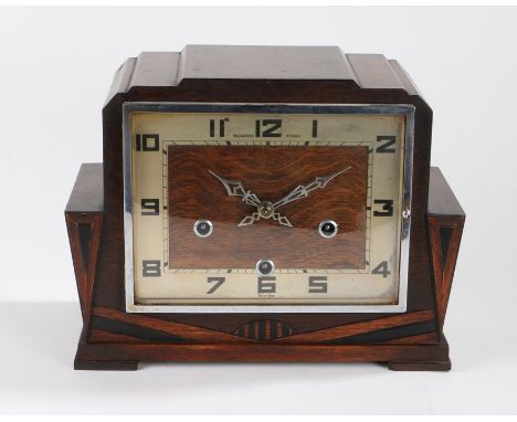 Bravingtons Renown Art Deco style oak cased mantel clock, the rectangular dial with Arabic numerals, 29.5cm wide