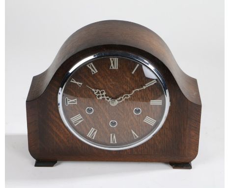 Smiths oak cased mantel clock, the dial with silvered Roman numerals, 29cm wide