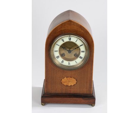 Edwardian mantel clock, the arched case with fan marquetry inlay, the ivorine dial with Roman numerals, 17cm wide, 28.5cm hig