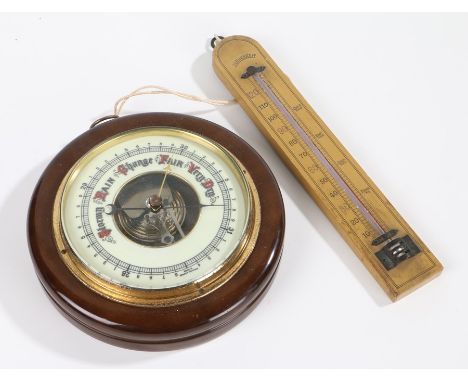 West German circular barometer with enamel dial,18cm diameter, together with a thermometer, 25cm long (2)