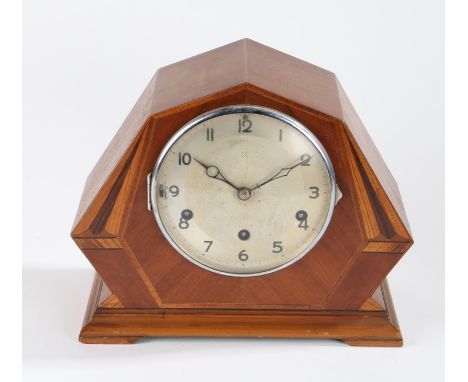 Art Deco style mantel clock, the shaped case with marquetry inlay, the white dial wit Arabic numerals, 30cm wide, 24cm high