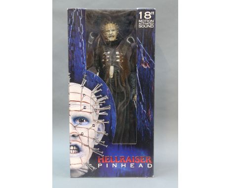 A boxed NECA Reel Toys 18inch motion activated sound action figure, Pin Head of "Hell Raiser"