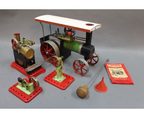 A Mamod TE1A Steam Tractor, an MM2 live steam stationery engine with burner, a Mamod model power hammer and a model power pre