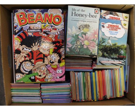 A box of modern The Beano annuals, Thomas the Tank Engine and Friends, Buzz books story books, and other Ladybird First Reade
