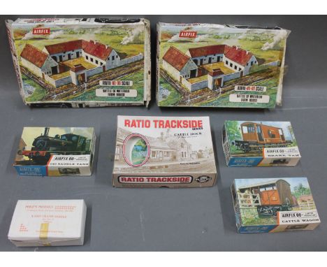 A group of 3 Airfix 00 scale construction kits, to include a cattle wagon, a 040 saddle tank and a brake van, a Ratio plastic