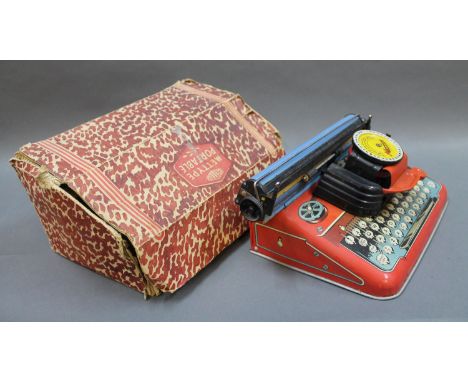 A boxed Mettoy tin plate Mettype Junior typewriter 