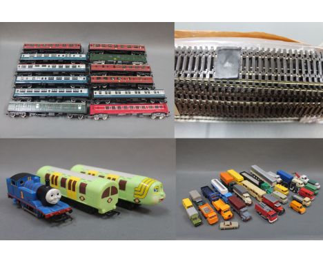 A group of twelve 00 gauge Hornby and Jouef plastic coaches, 2 Bachmann Branchline "Underground Ernie" coaches, a Hornby 00 g