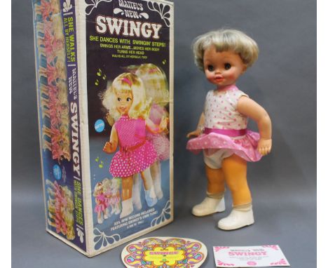 A boxed 1969 battery operated Mattel 'Swingy' doll 