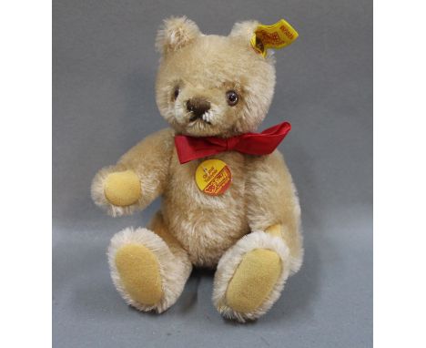 A Steiff Original mask teddy bear, with ID and working squeaker, measuring 18cm high 