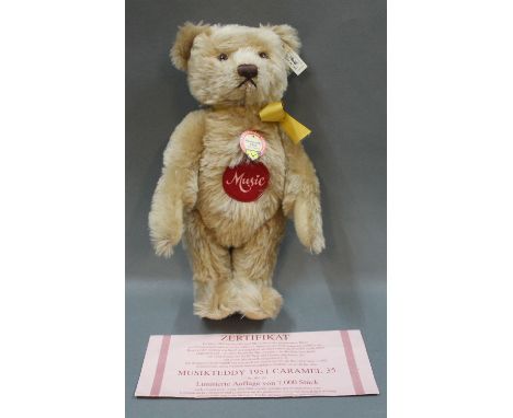 A Steiff Original 1993 replica of the 1951 musical teddy bear, limited edition (1105/7000), with certificate