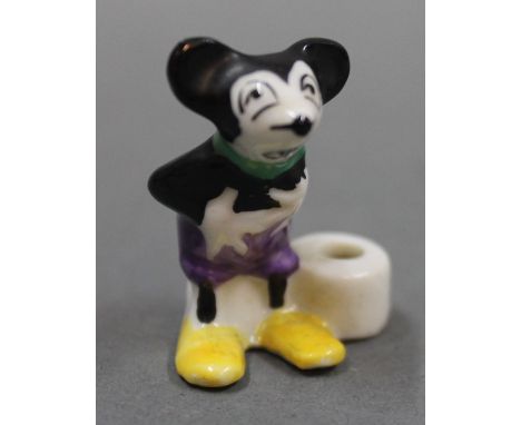 A miniature rat-faced Mickey the Mouse chamber stick, measuring 3cm high