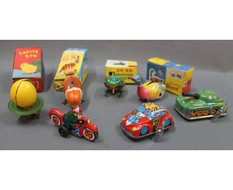 A collection of boxed and unboxed Chinese & Japanese tin plate clockwork toys: "Easter Egg" (MS033), "Swimming Duck" (MS042),