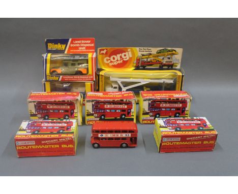 A group of 5 Lone Star die cast model routemaster buses, a Corgi Super Mercedes-Benz transporter (2014), a Dinky land rover b