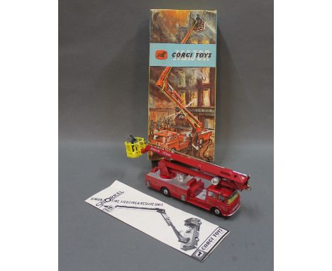 A Corgi Major Simon Snorkel Fire Engine (1127) displayed in a lift off lid picture box