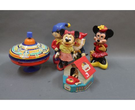 A Chad Valley humming top, a plastic mechanical "Doggy House" money bank, 2 Disney Minnie & Mickey mouse figurines and two ot