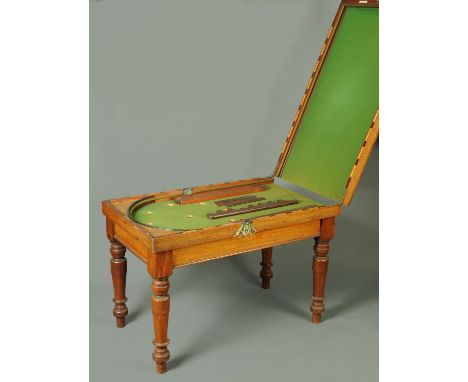 A Victorian mahogany Orme and Sons bagatelle table, having green felt playing surface and raised on turned legs, length when 