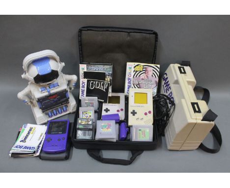 A box of Nintendo Game Boys, Game Boy and Game Boy Colour games and a 1992 Tomy 2-XL Talking Educational robot with tapes