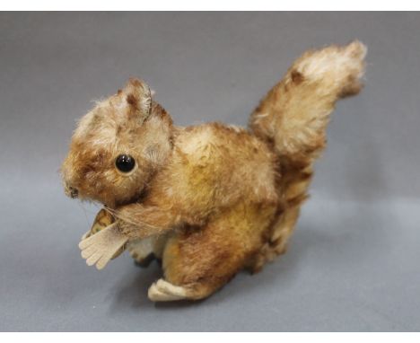 A Steiff "Perri" Squirrel, having no button, measuring 12cm high 