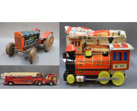 A Mettoy tin plate tractor, a pressed steel Nylint fire engine Co.5, and a Chinese tin plate battery operated ME684 locomotiv