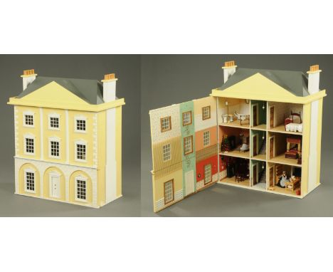 A large Georgian style 3 storey cream coloured and light up dolls house, having detachable roof, and a collection of dolls ho