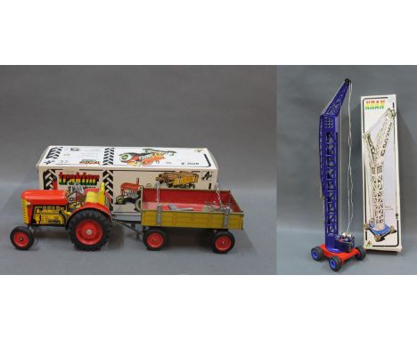 Two boxed Czechoslovakian tinplate Kovap toys: a Zetor clockwork tractor and trailer & a Jerab crane