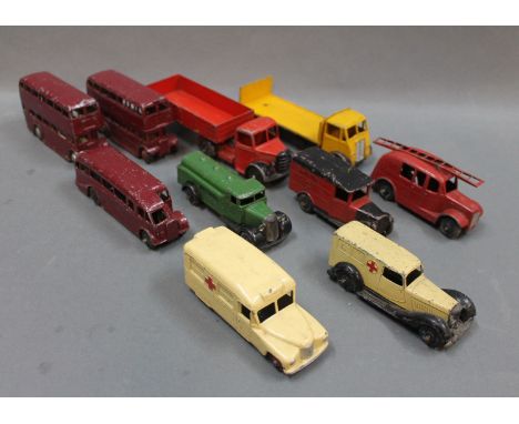 A group of 10 Dinky buses, lorries, ambulances and a fire engine 