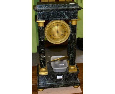 A green marble portico striking mantel clock, second half of the 19th century