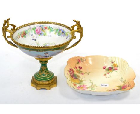 A Royal Worcester blush ivory and floral decorated bowl; and a Sevres style gilt metal and painted porcelain pedestal bowl (a