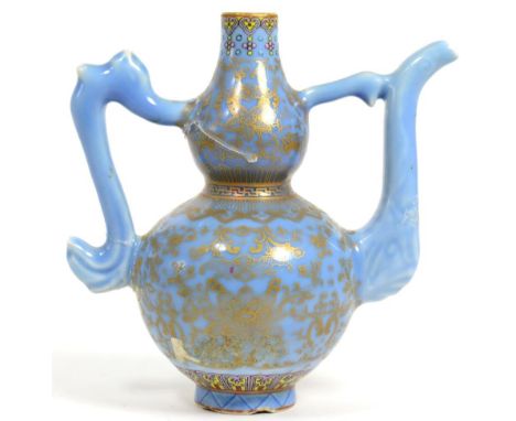 A Chinese blue ground wine pot, seal mark to base, 14cm high (a.f.)