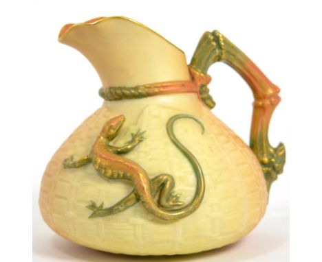A Royal Worcester porcelain jug with applied lizard 