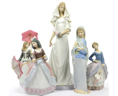A group of five Lladro figurines including three girls with umbrellas, a bride and a girl carrying lilies (a.f.)