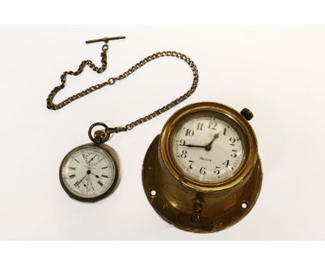 A small brass cased eight day ships clock, the white enamel dial signed Junghans, together with a silver cased pocket watch, 